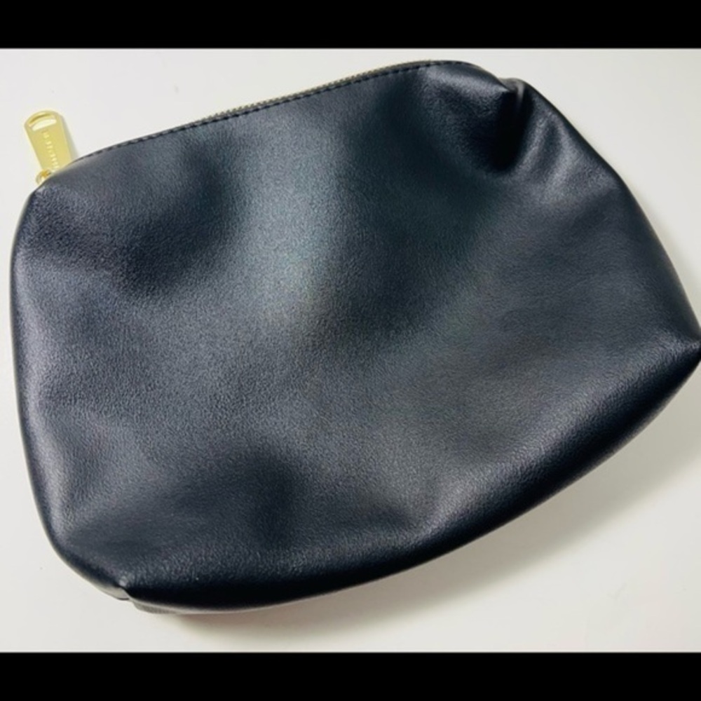 Steve Madden solid black makeup pouch or clutch